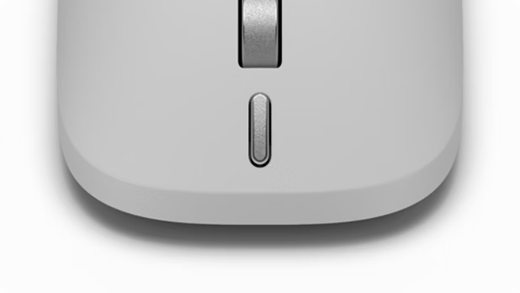 Close up of the action button at the front of the Surface Mouse (Second Edition).