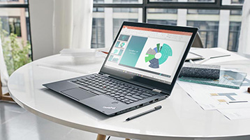 A laptop with a PowerPoint presentation open
