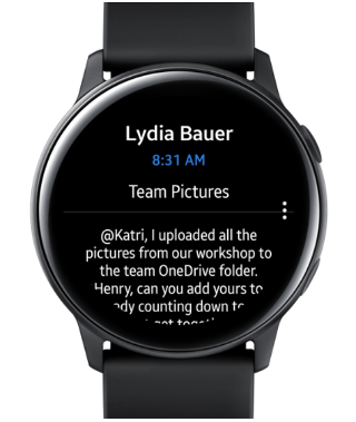 Shows a Samsung Galaxy watch with an email on the screen.